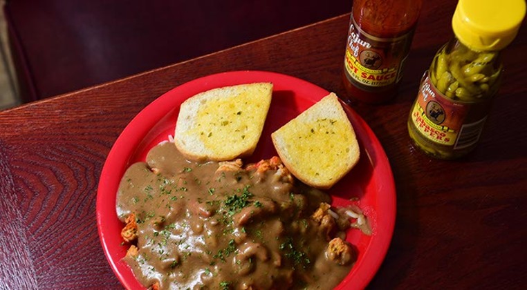 From frog legs to boudin balls, this Cajun eatery is proud of its menu