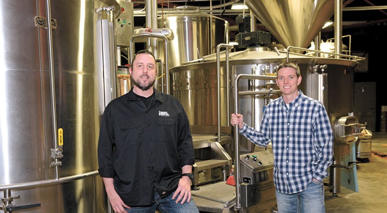 Dave Monks and Jerod Millirons? at Iron Monk Brewing in Stillwater. (Garett Fisbeck)