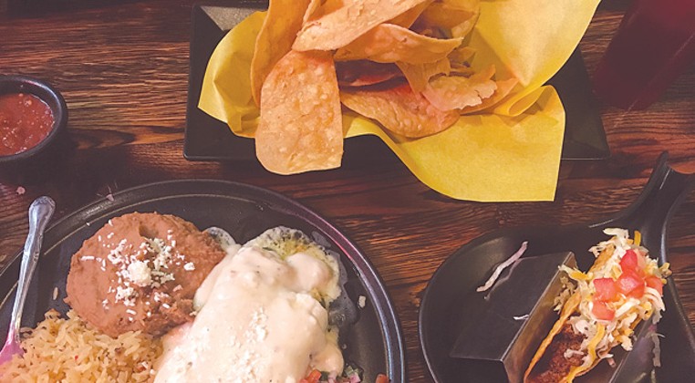 The chicken enchilada plate comes with a hard-shell taco. | Photo Jacob Threadgill