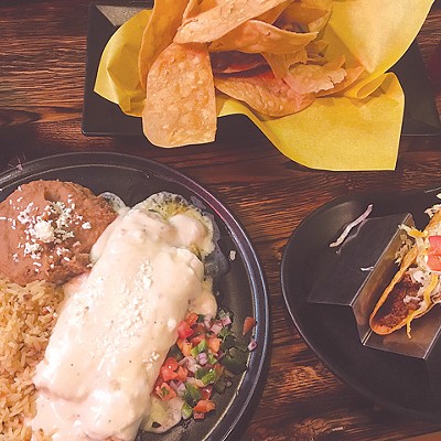 The chicken enchilada plate comes with a hard-shell taco. | Photo Jacob Threadgill