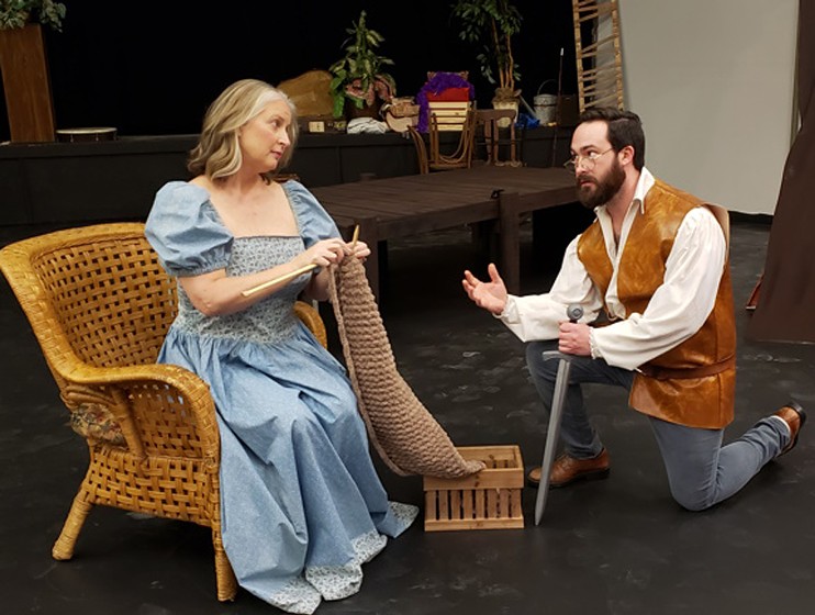 Colombine (Denise Hughes) as Penelope listens impatiently Capitano (John C. Arnold) as Odysseus explains his long voyage home from the Trojan War.