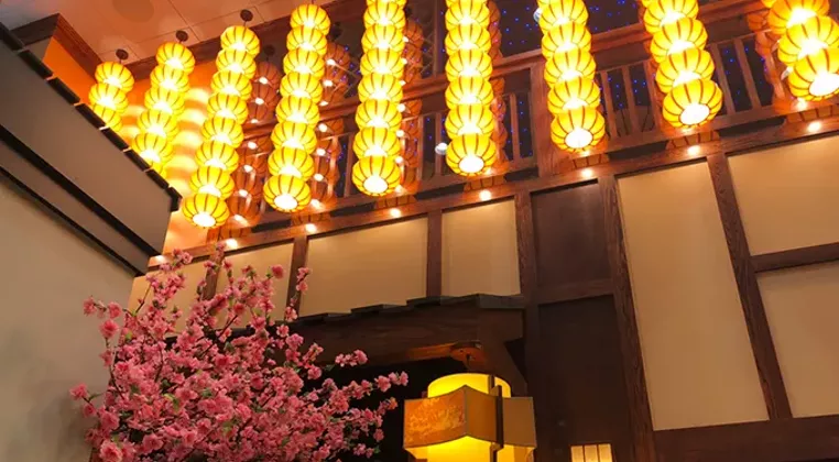 Cherry trees line the courtyard entrance of Kwans Kitchen. (Photo provided)