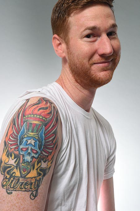 Comedian Spencer Hicks with his misspelled (then &#147;fixed&#148;) tattoo. (Mark Hancock)