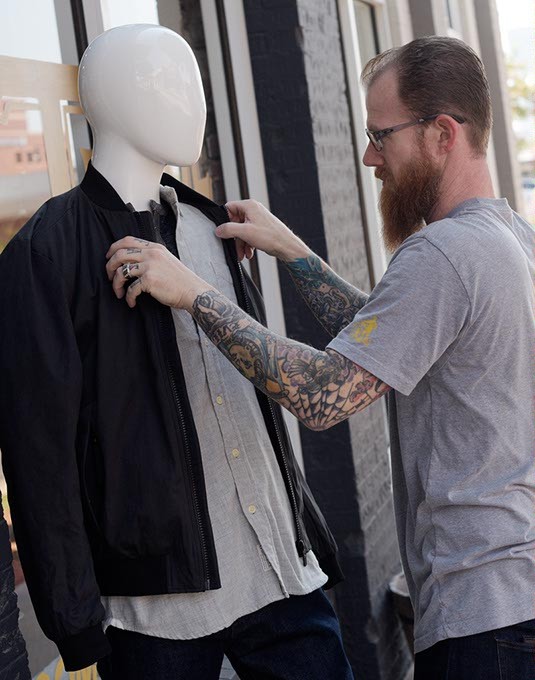 Daniel McCloud of Trade Men&#146;s Wares is breaking out a new line of field jackets for the fall. | Photo Garett Fisbeck