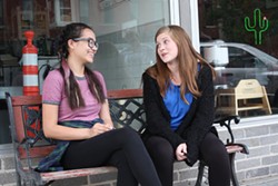 From left, Teens Katia Harm and Zoe White recall their first time hearing about sex from adults four years ago. (Laura Eastes)