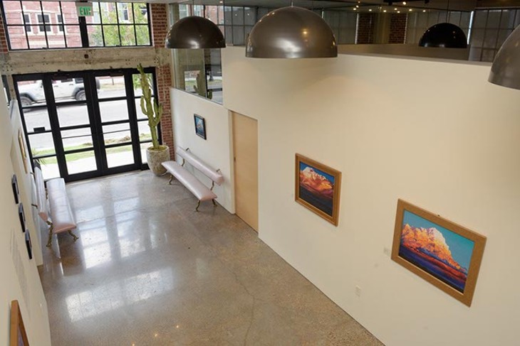 Works from David Holland&#146;s Cloudscapes hang in FG Gallery, part of the Fulmer Sill law firm. (Garett Fisbeck)