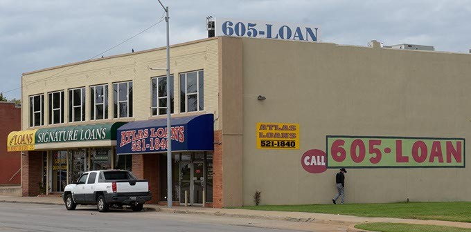 Quick Loans, Signature Loans and Atlas Loans operate along NW 23rd Street near Broadway Exchange. (Garett Fisbeck)
