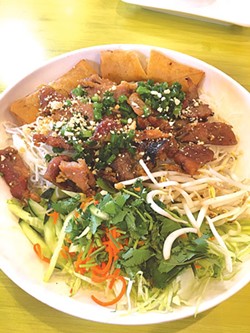 The vermicelli bowl includes house-made egg rolls and grilled pork. (Photo Jacob Threadgill)