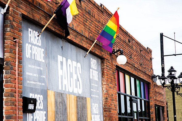 Lgbt Community Gay Club with Rainbow Flag on the Facade of a Brick